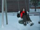 Lucile on a tire swing.